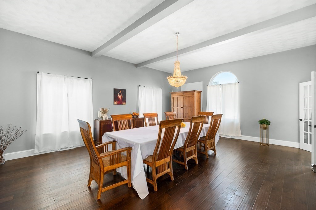 20 Landers Road Stoneham, MA 02180 - Photo 16 of 36 a view of a dining room with furniture window and wooden floor
