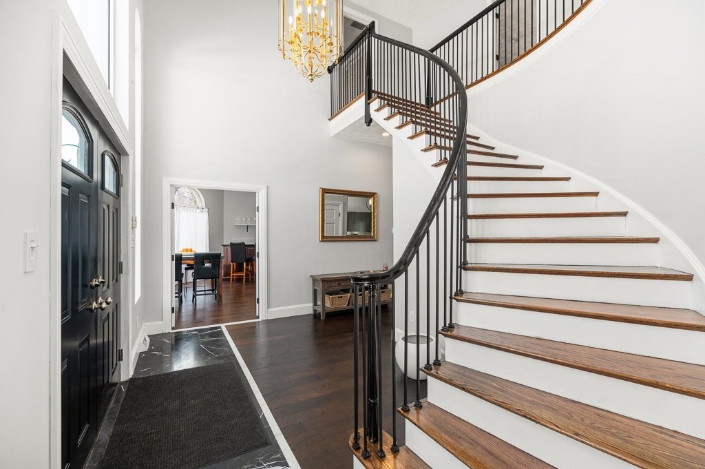 20 Landers Road Stoneham, MA 02180 - Photo 4 of 36 a view of entryway and hall with wooden floor