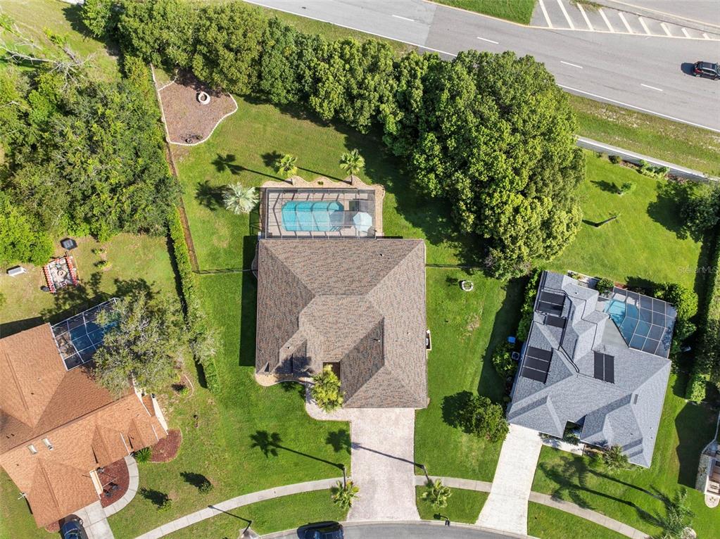 14207 Cornewall Lane Spring Hill, FL 34609 - Photo 32 of 63 an aerial view of a house with a yard