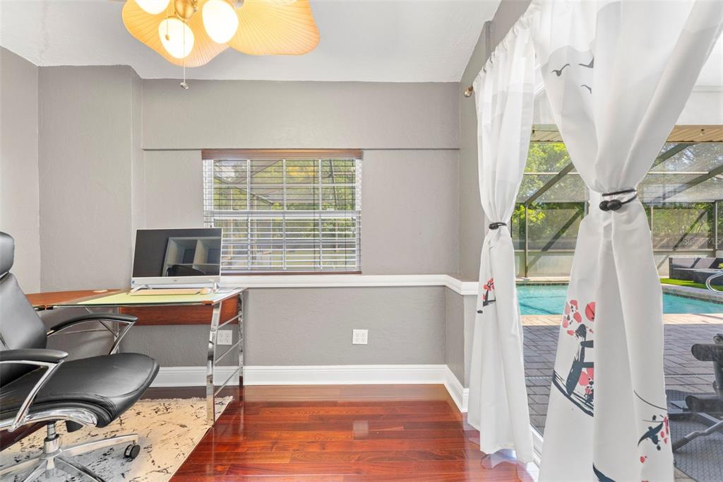 14207 Cornewall Lane Spring Hill, FL 34609 - Photo 33 of 63 a workspace with furniture and window