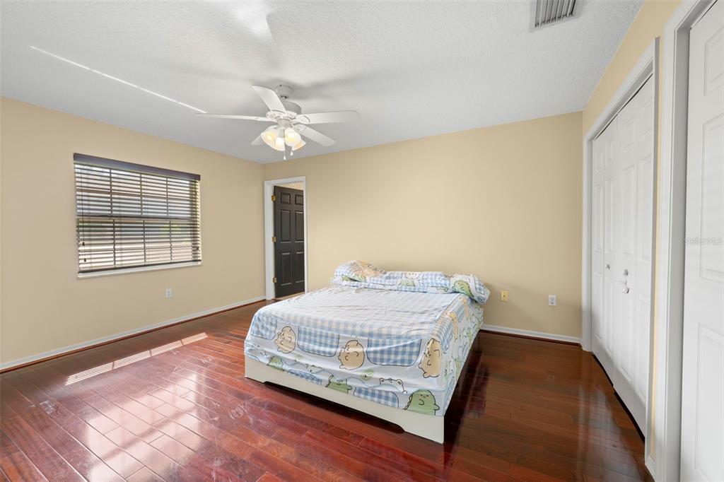 14207 Cornewall Lane Spring Hill, FL 34609 - Photo 41 of 63 a room with a bed and window