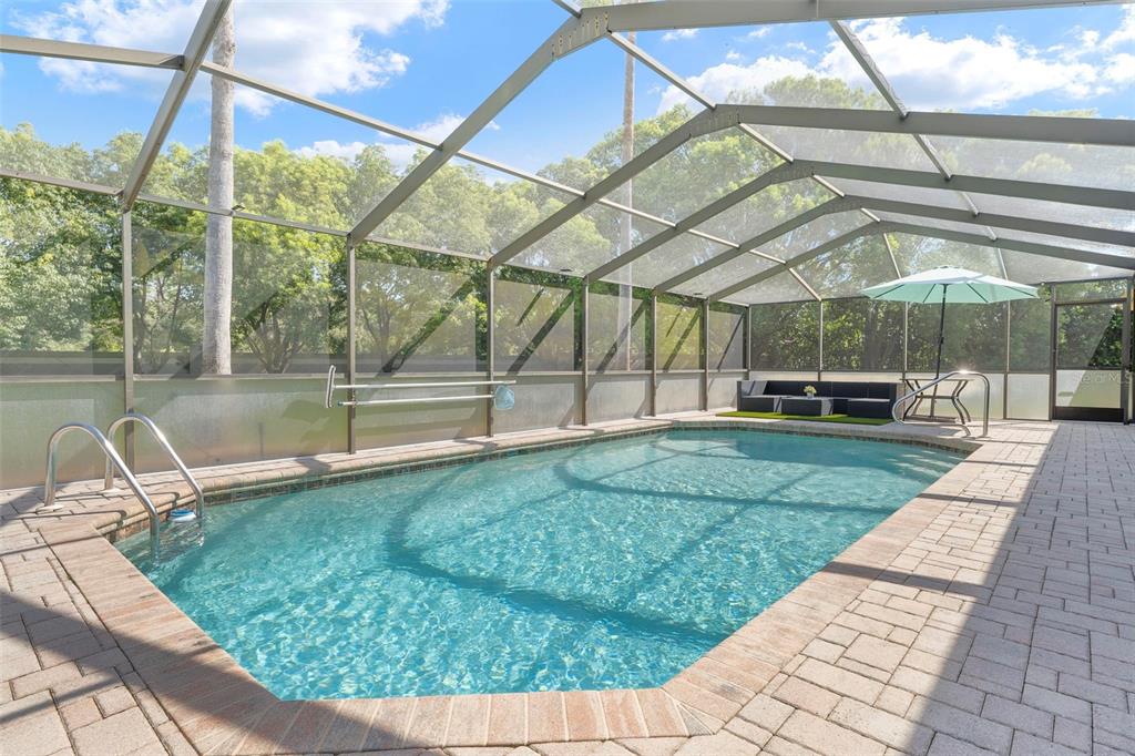 14207 Cornewall Lane Spring Hill, FL 34609 - Photo 57 of 63 a view of a porch with a backyard