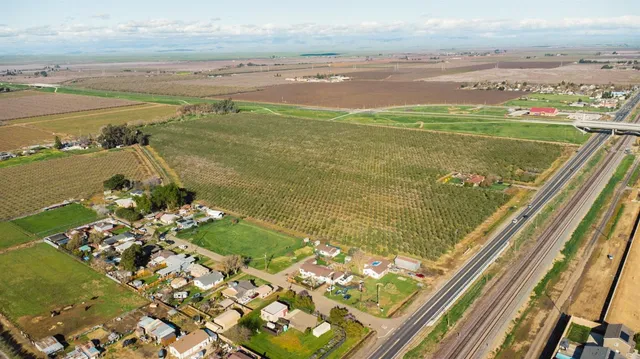a view of a lake with a big yard