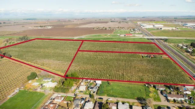 a view of an outdoor space with wooden floor