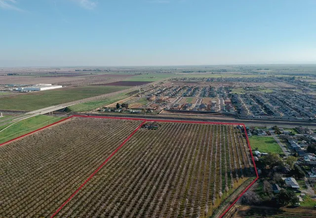a view of balcony with wooden floor