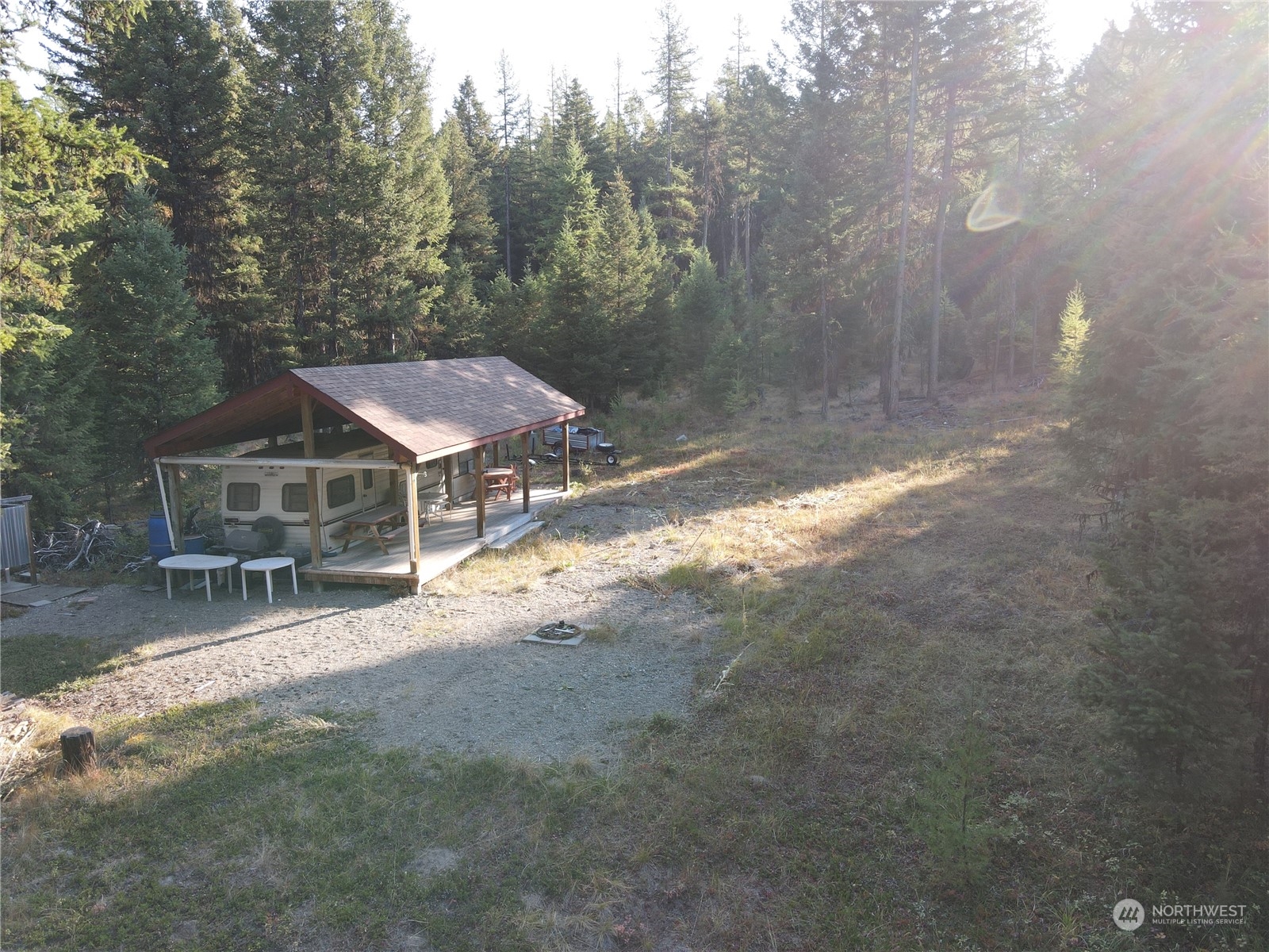 5 Prior Loop Road Oroville, WA 98844 - Photo 20 of 34 a view of a house with a yard