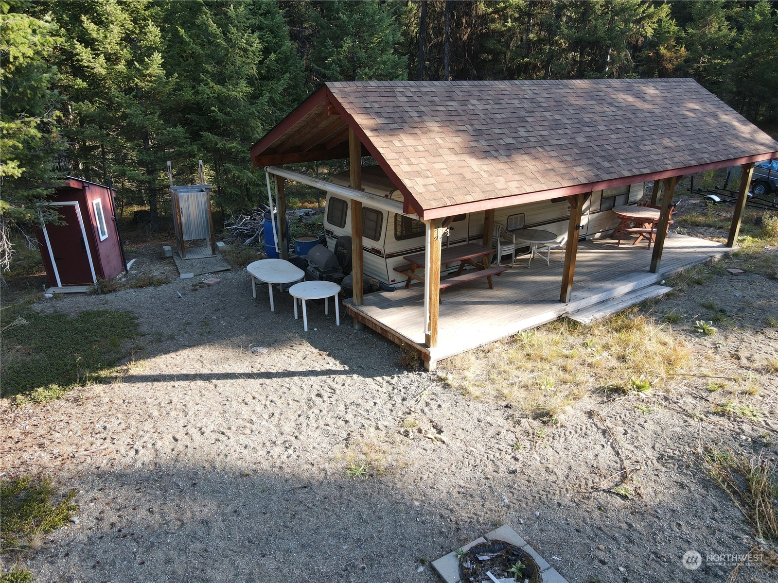 5 Prior Loop Road Oroville, WA 98844 - Photo 7 of 34 a view of house with backyard space and sitting area