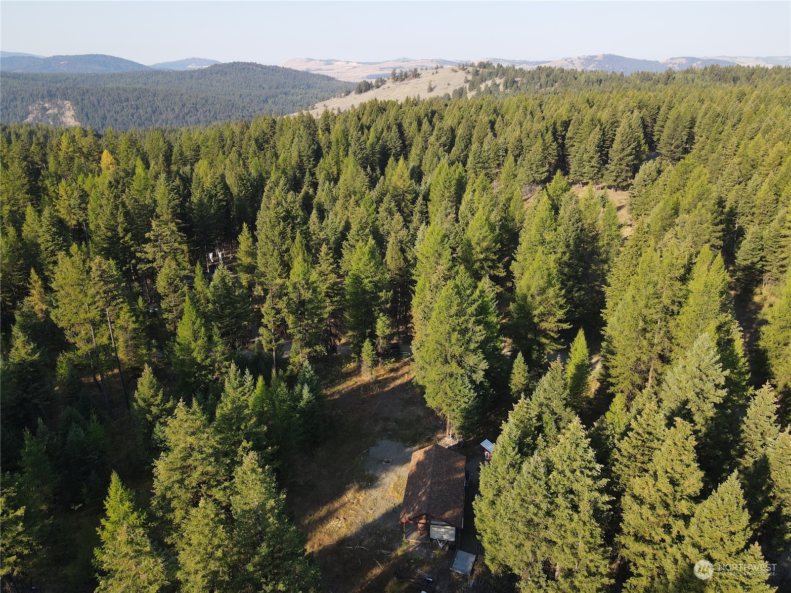 5 Prior Loop Road Oroville, WA 98844 - Photo 10 of 34 a view of an outdoor space and a yard