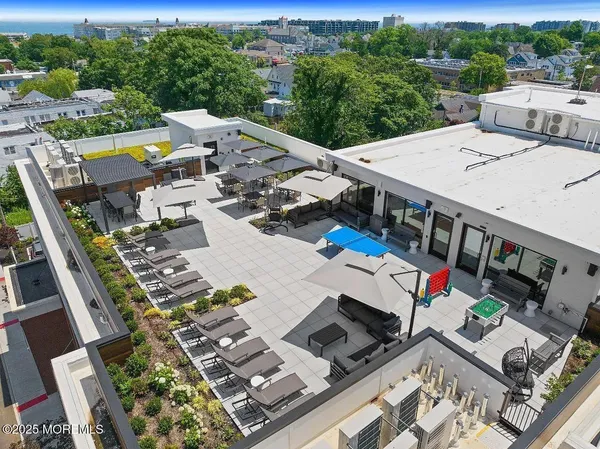 an aerial view of a house with outdoor space