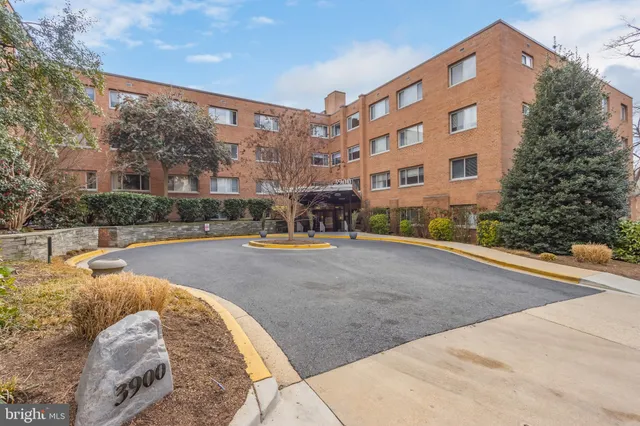 a view of building with swimming pool