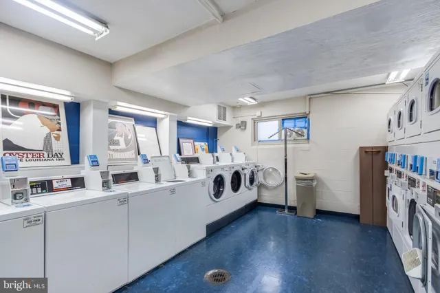 a kitchen with a sink and a refrigerator