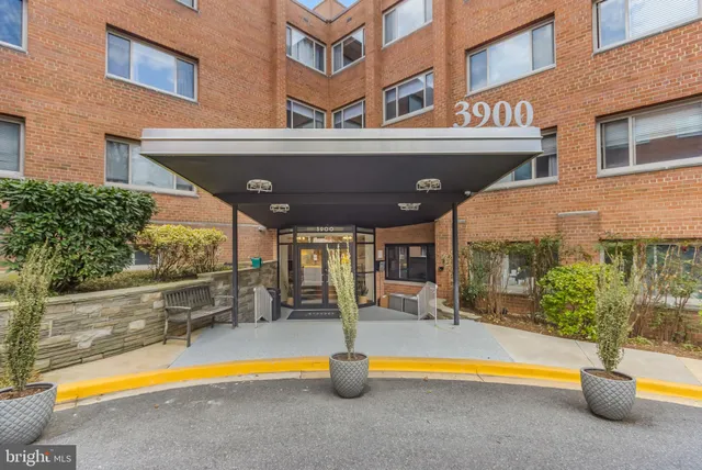 a view of a building with a swimming pool