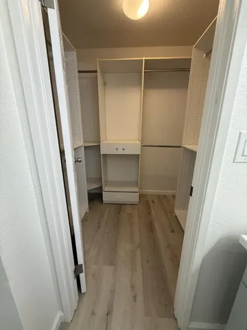 a bathroom with 2 sink and a mirror