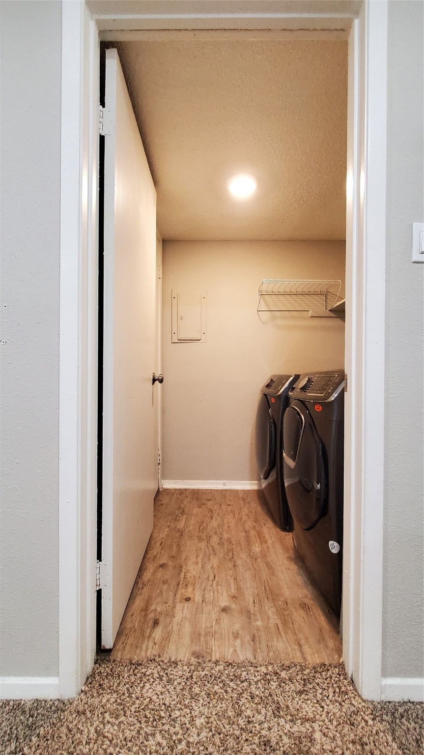 3768 Tanglewilde Street, Unit J5 Houston, TX 77063 - Photo 14 of 24 a view of walk in closet with clothes and shoes