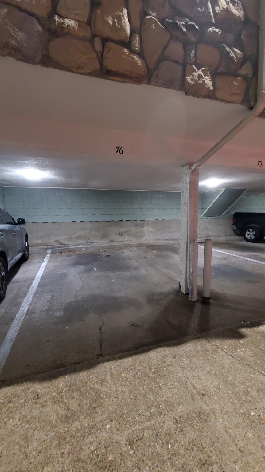 3768 Tanglewilde Street, Unit J5 Houston, TX 77063 - Photo 19 of 24 a view of parking area