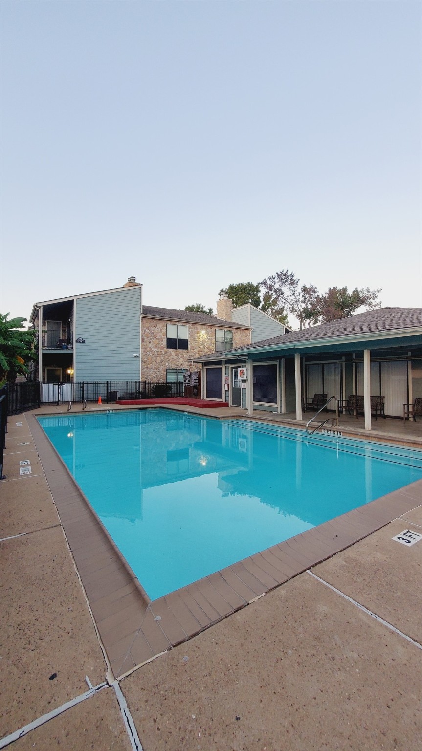 3768 Tanglewilde Street, Unit J5 Houston, TX 77063 - Photo 21 of 24 a view of a house with a roof deck