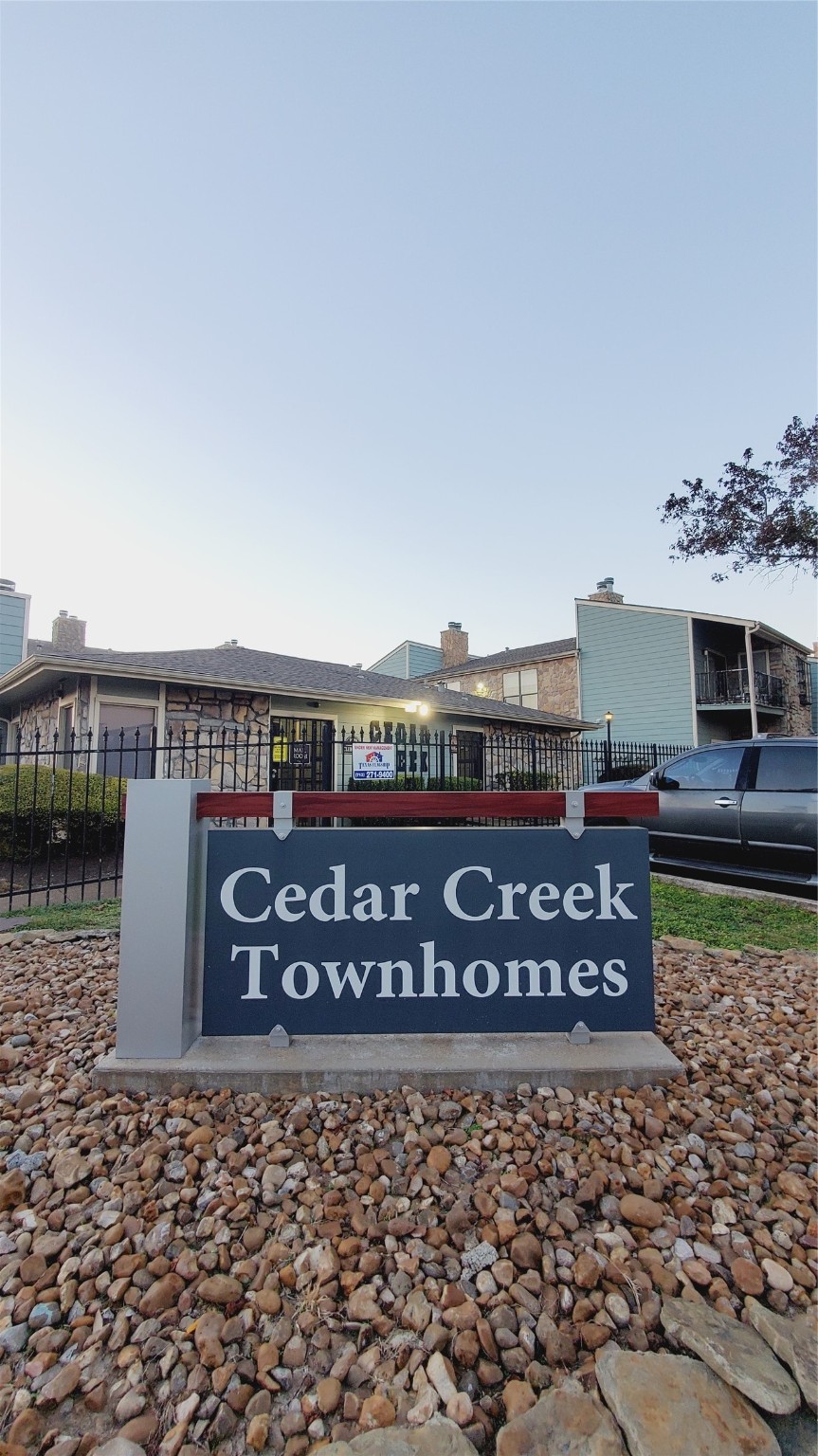 3768 Tanglewilde Street, Unit J5 Houston, TX 77063 - Photo 24 of 24 a view of outdoor space with sign board