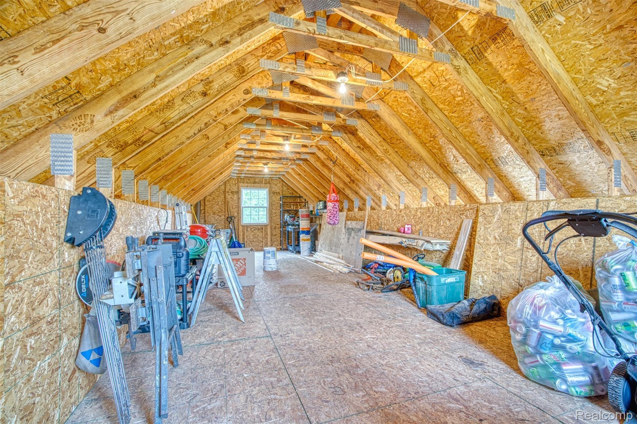 7016 West Lange Road Fowlerville, MI 48836 - Photo 55 of 61 LOFT SPACE FOR ADDITIONAL STORAGE OR AN APARTMENT???