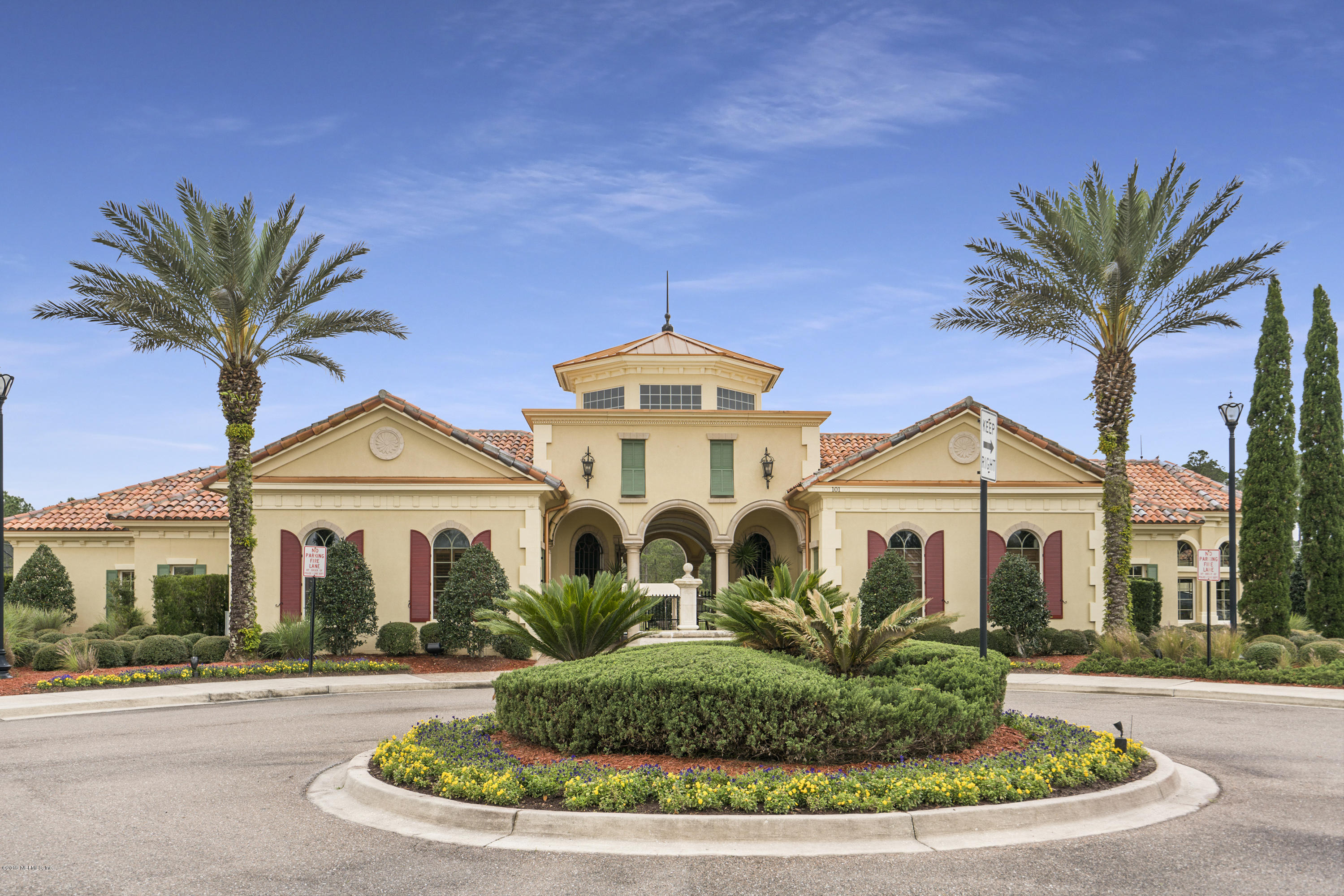 1409 Riva Del Garda Way St. Augustine, FL 32092 - Photo 26 of 41 a front view of a house with a garden