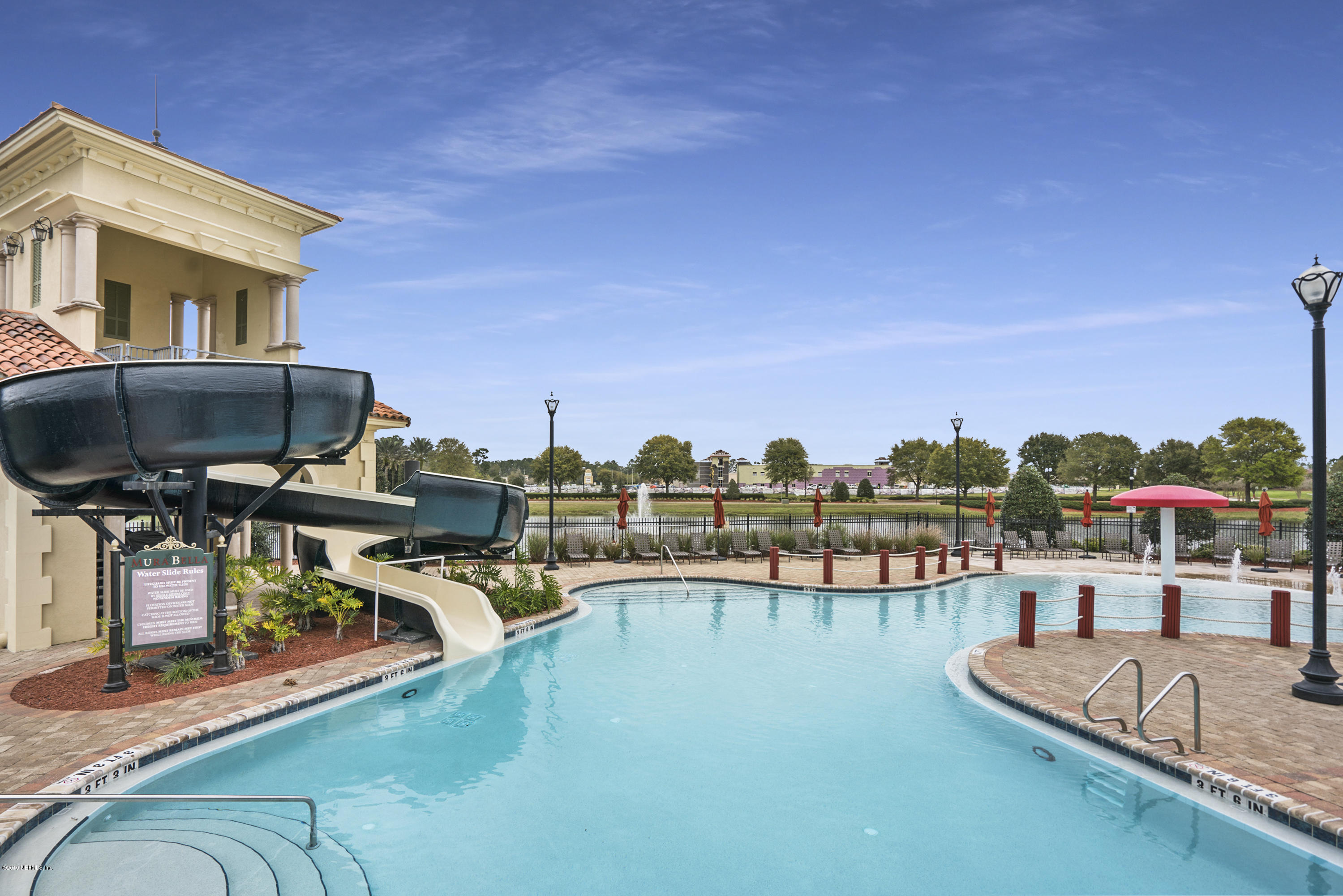 1409 Riva Del Garda Way St. Augustine, FL 32092 - Photo 30 of 41 a view of a swimming pool with seating area