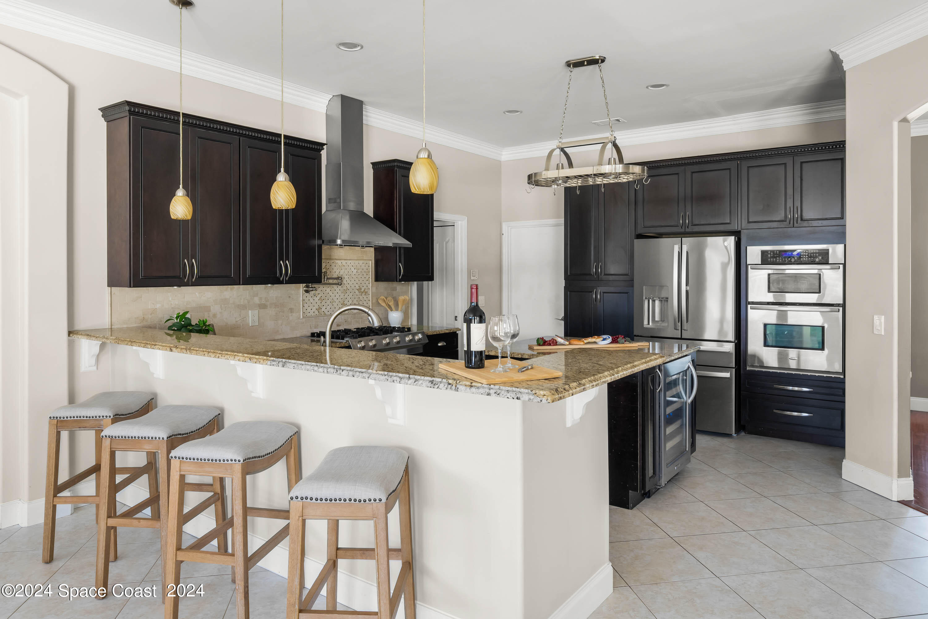 1122 Jan's Place Melbourne, FL 32940 - Photo 11 of 42 a kitchen with a sink and cabinets