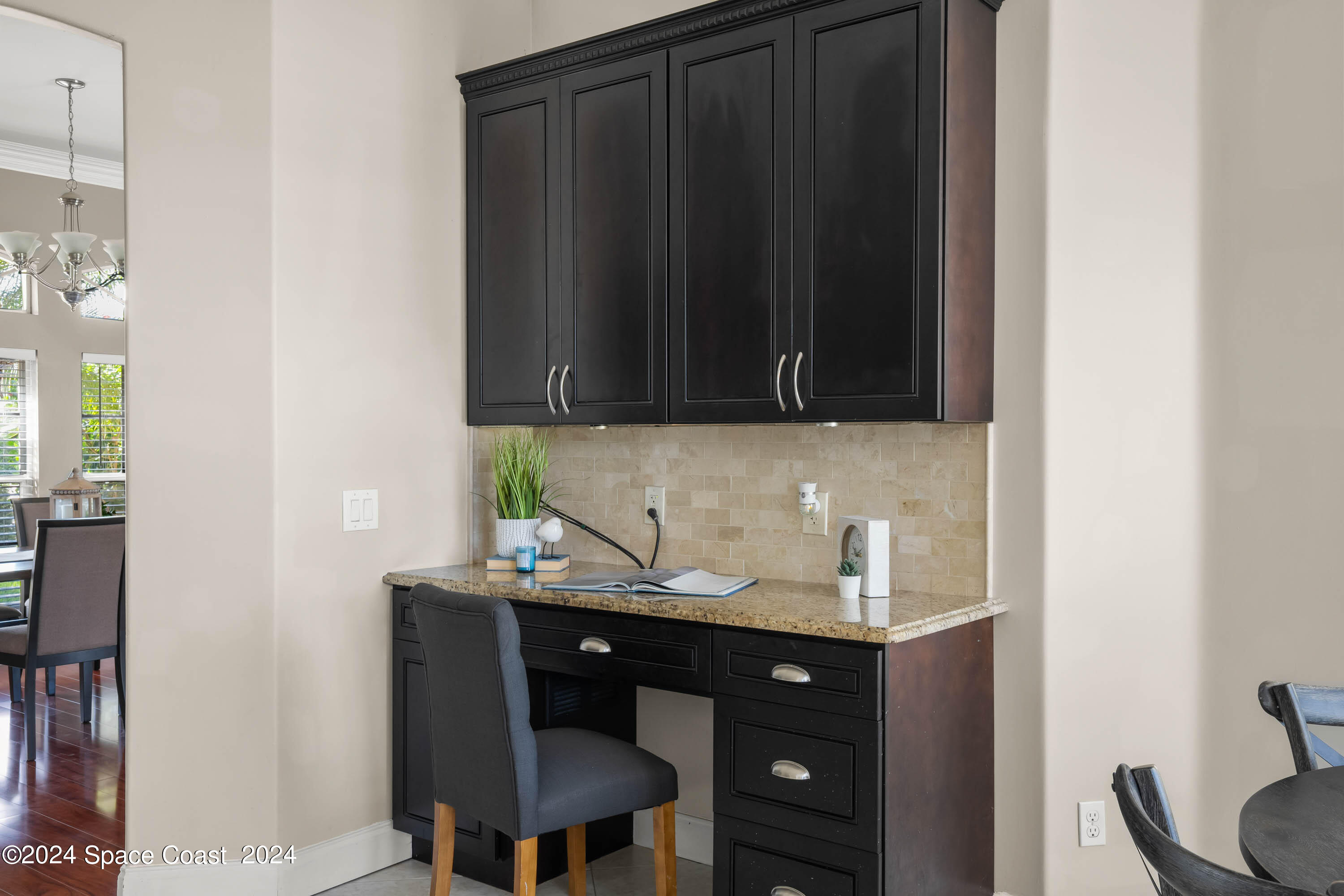 1122 Jan's Place Melbourne, FL 32940 - Photo 14 of 42 a bathroom with a sink vanity and toilet