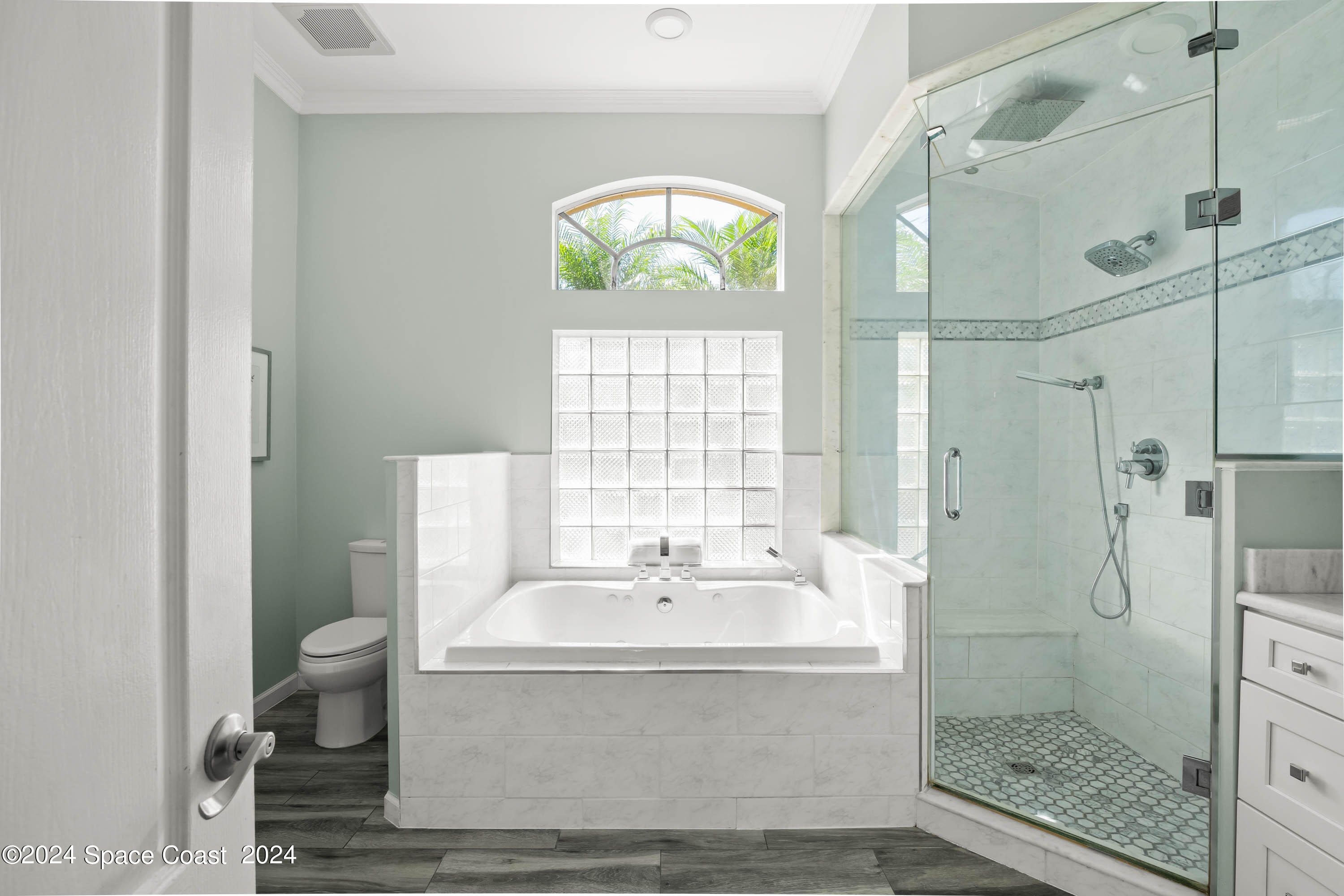 1122 Jan's Place Melbourne, FL 32940 - Photo 18 of 42 a bathroom with a sink toilet and shower