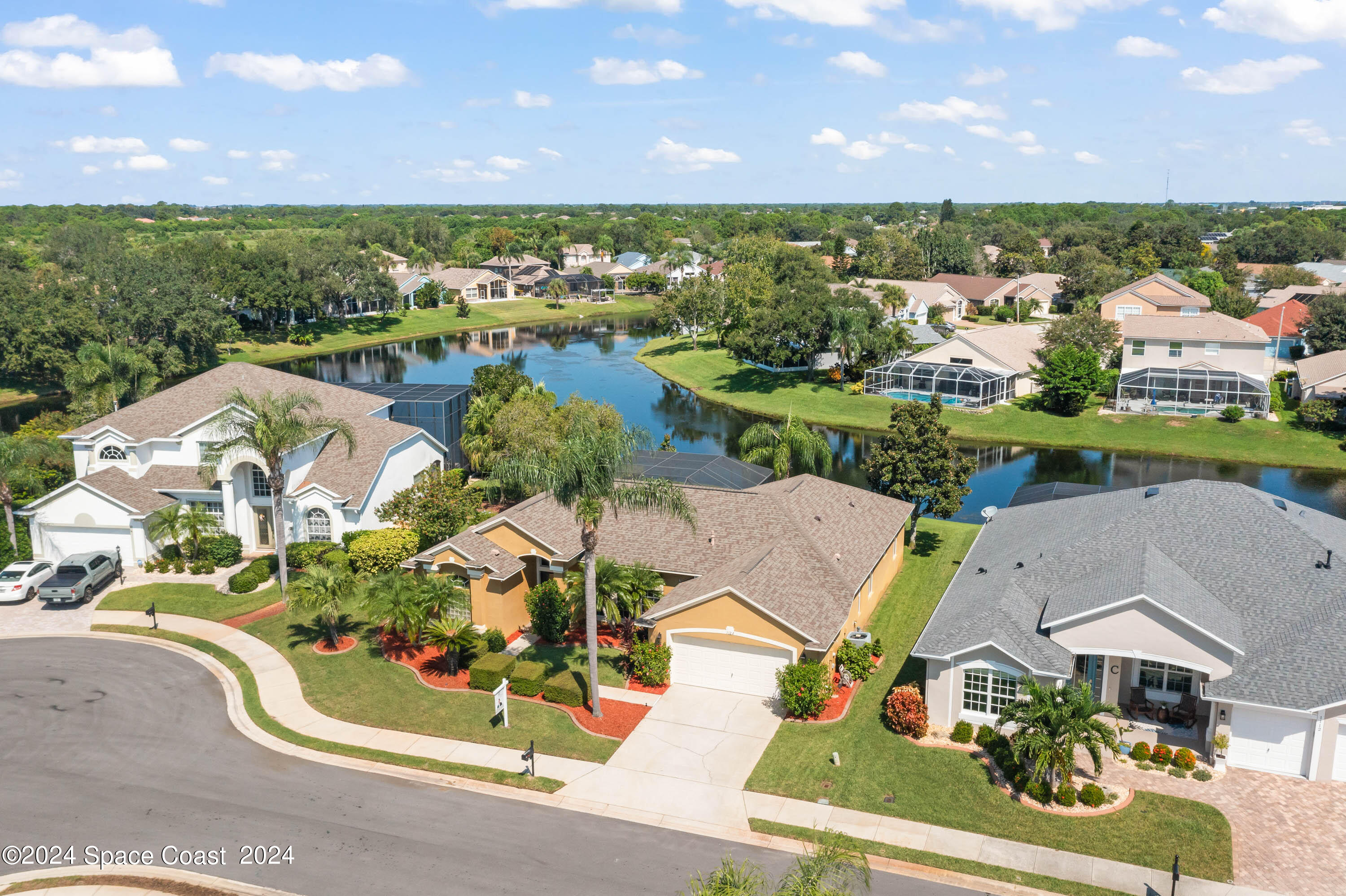 1122 Jan's Place Melbourne, FL 32940 - Photo 3 of 42 an aerial view of residential houses with outdoor space and swimming pool
