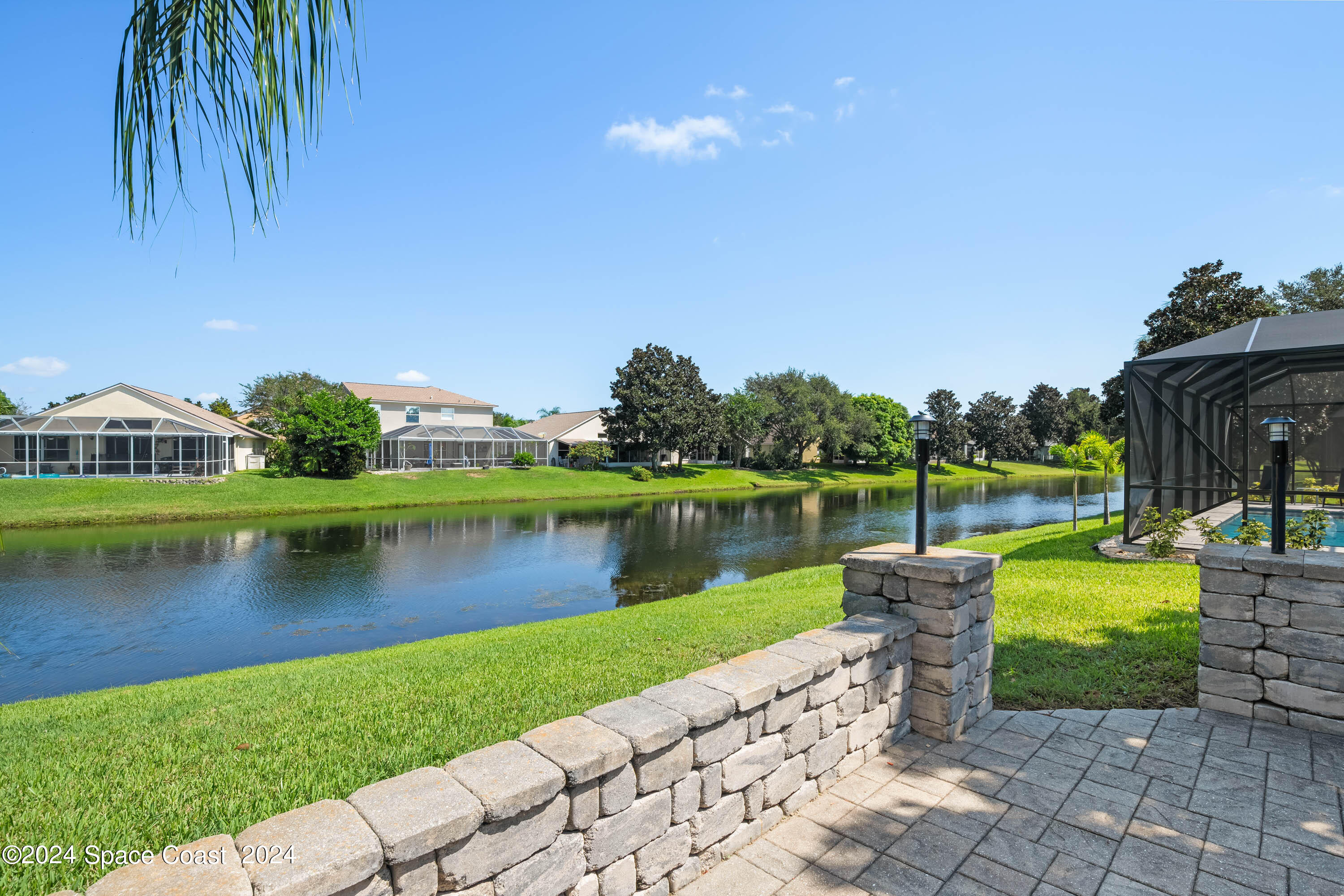 1122 Jan's Place Melbourne, FL 32940 - Photo 31 of 42 a lake view with a garden space