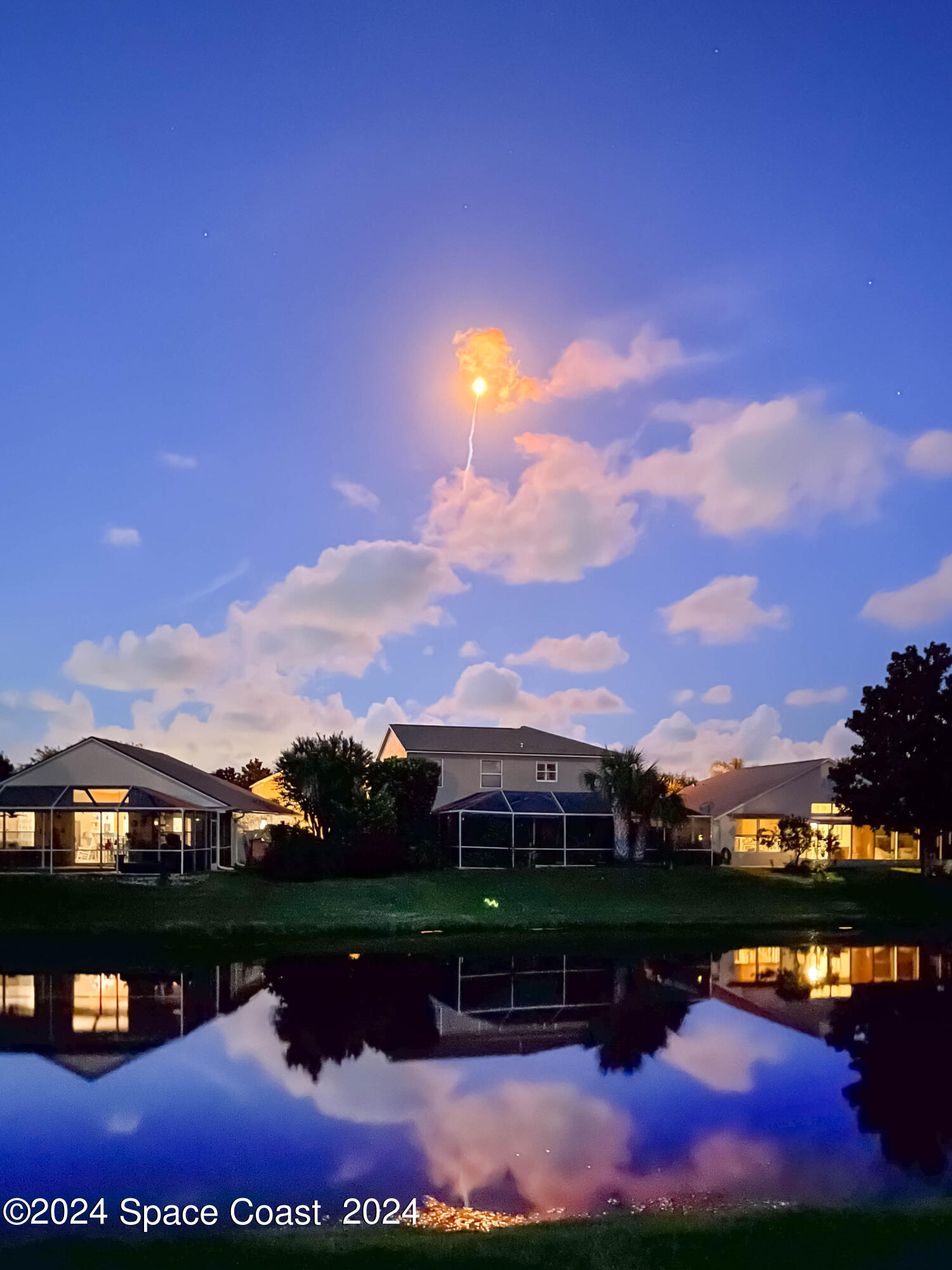 1122 Jan's Place Melbourne, FL 32940 - Photo 32 of 42 a sunset view with a lake