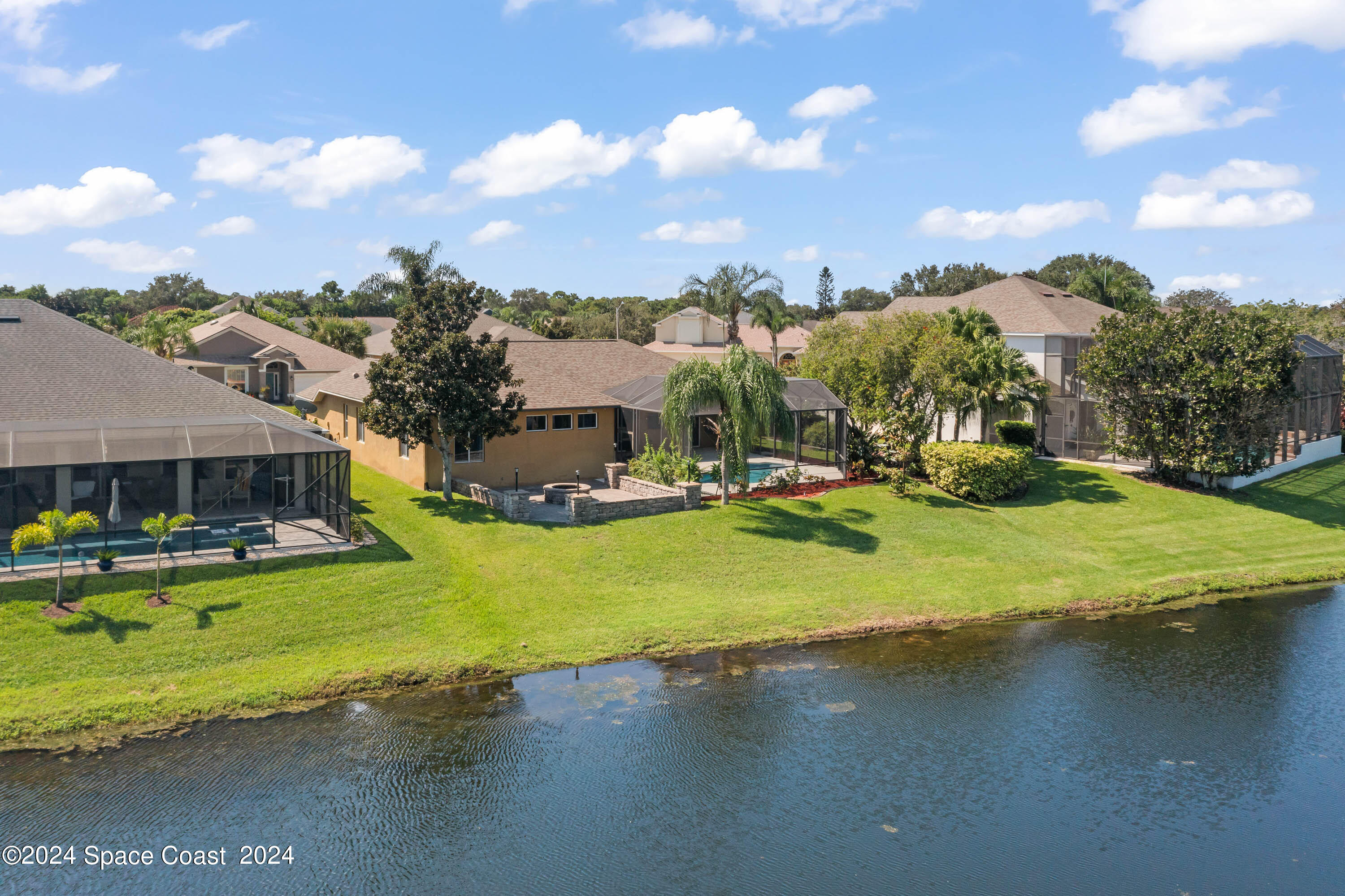 1122 Jan's Place Melbourne, FL 32940 - Photo 35 of 42 a view of a lake with houses