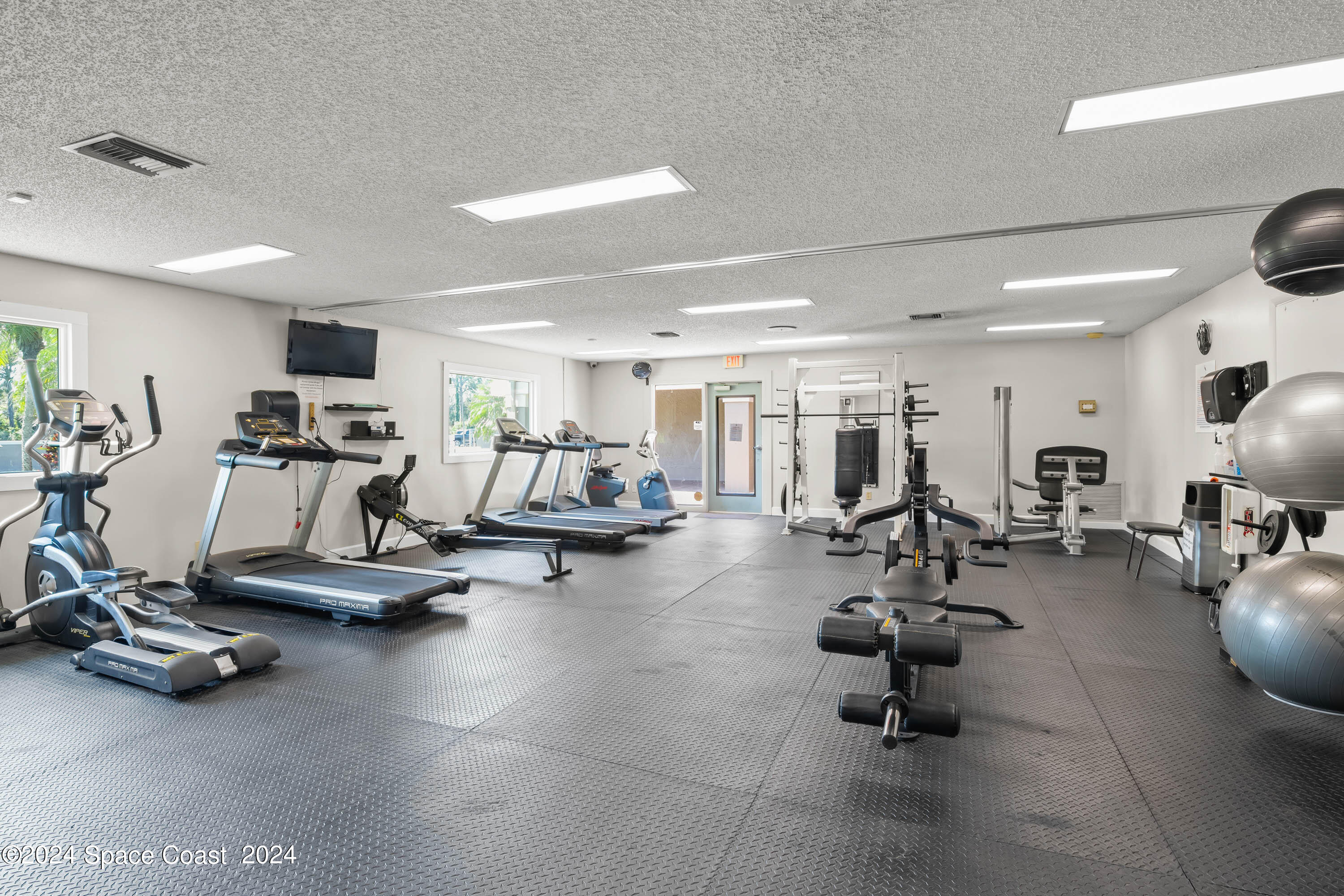 1122 Jan's Place Melbourne, FL 32940 - Photo 37 of 42 a view of a room with gym equipment