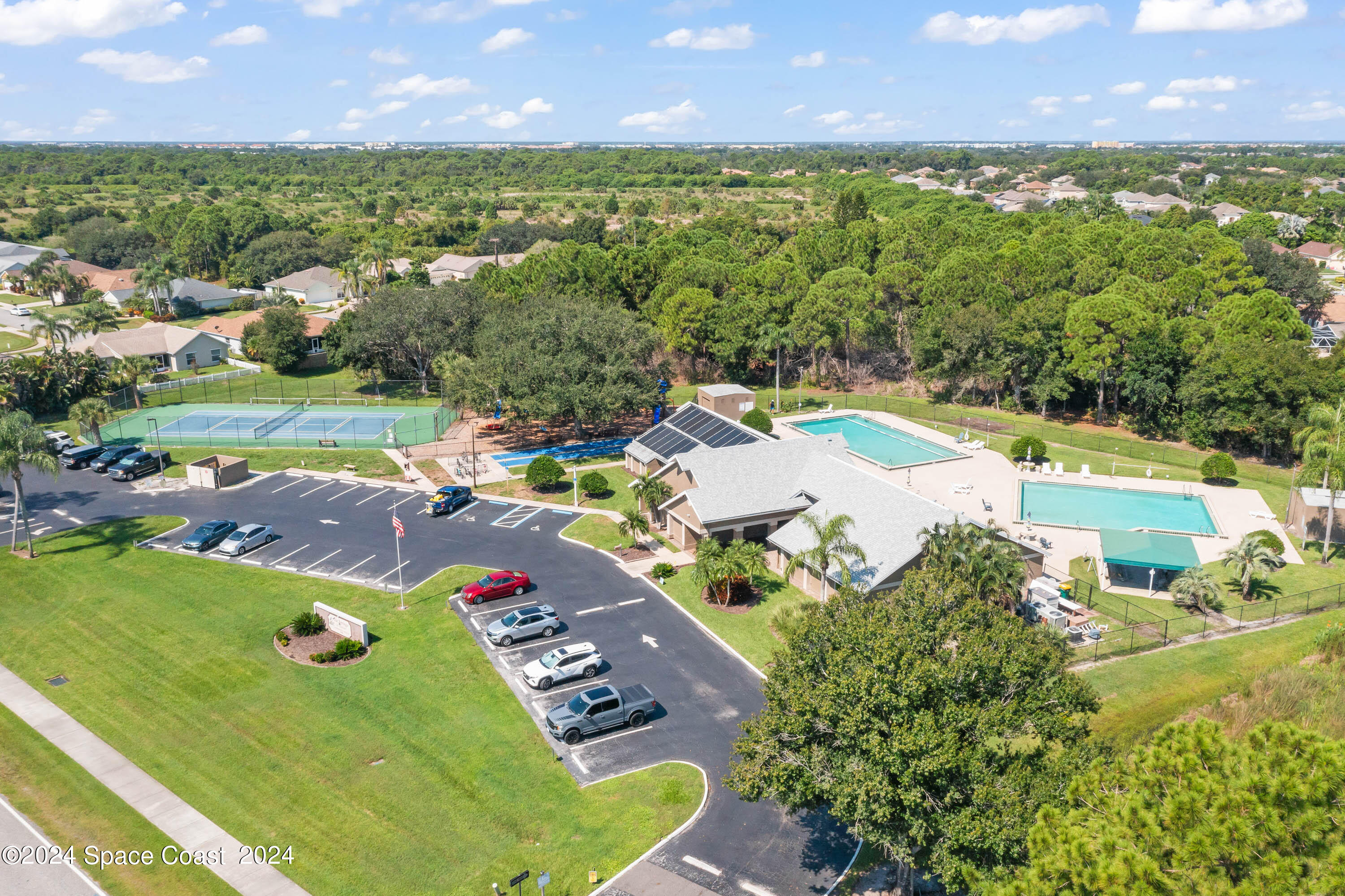 1122 Jan's Place Melbourne, FL 32940 - Photo 39 of 42 an aerial view of a house with a swimming pool yard and outdoor seating