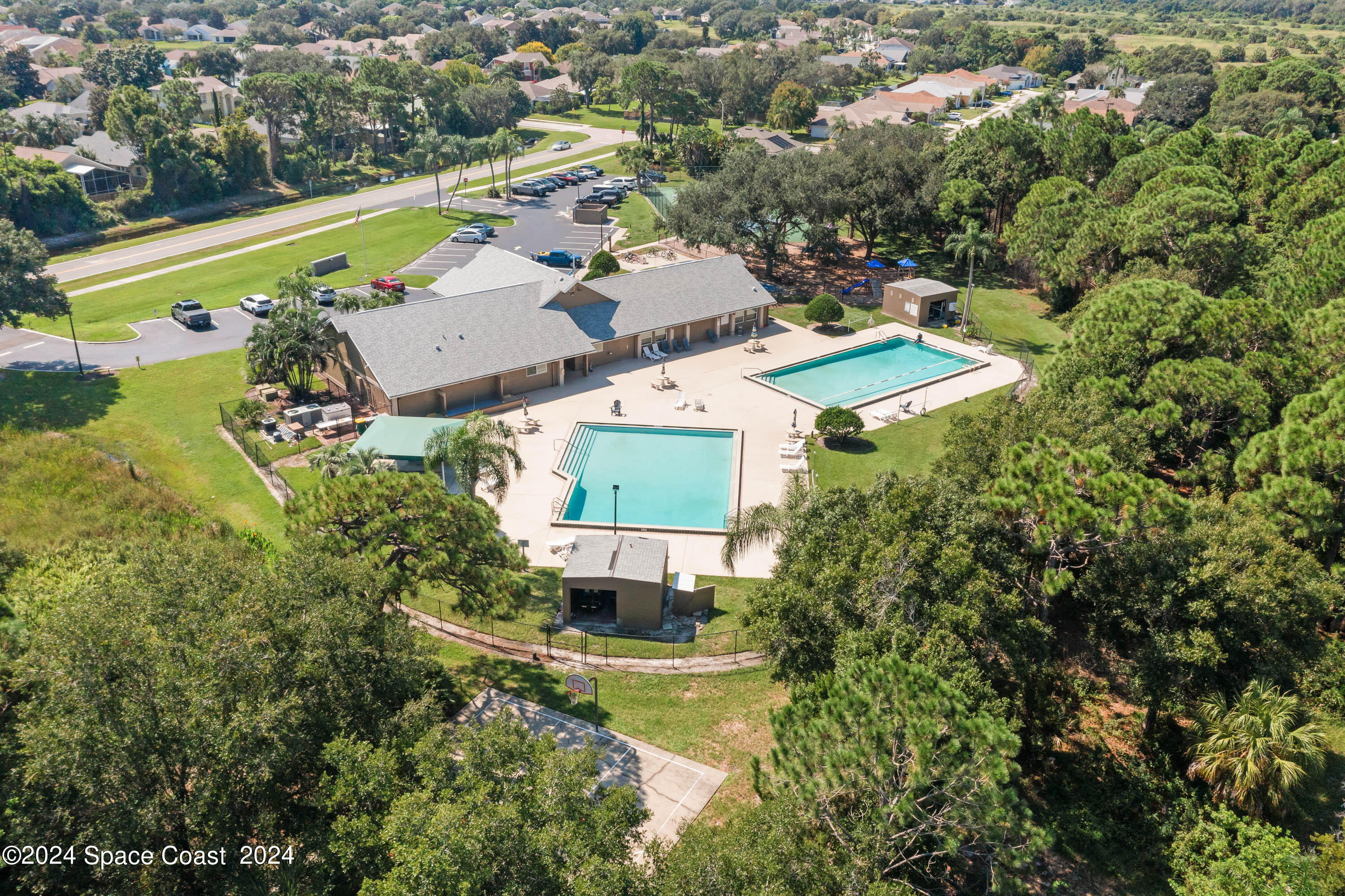 1122 Jan's Place Melbourne, FL 32940 - Photo 40 of 42 an aerial view of a house with a swimming pool yard and outdoor seating