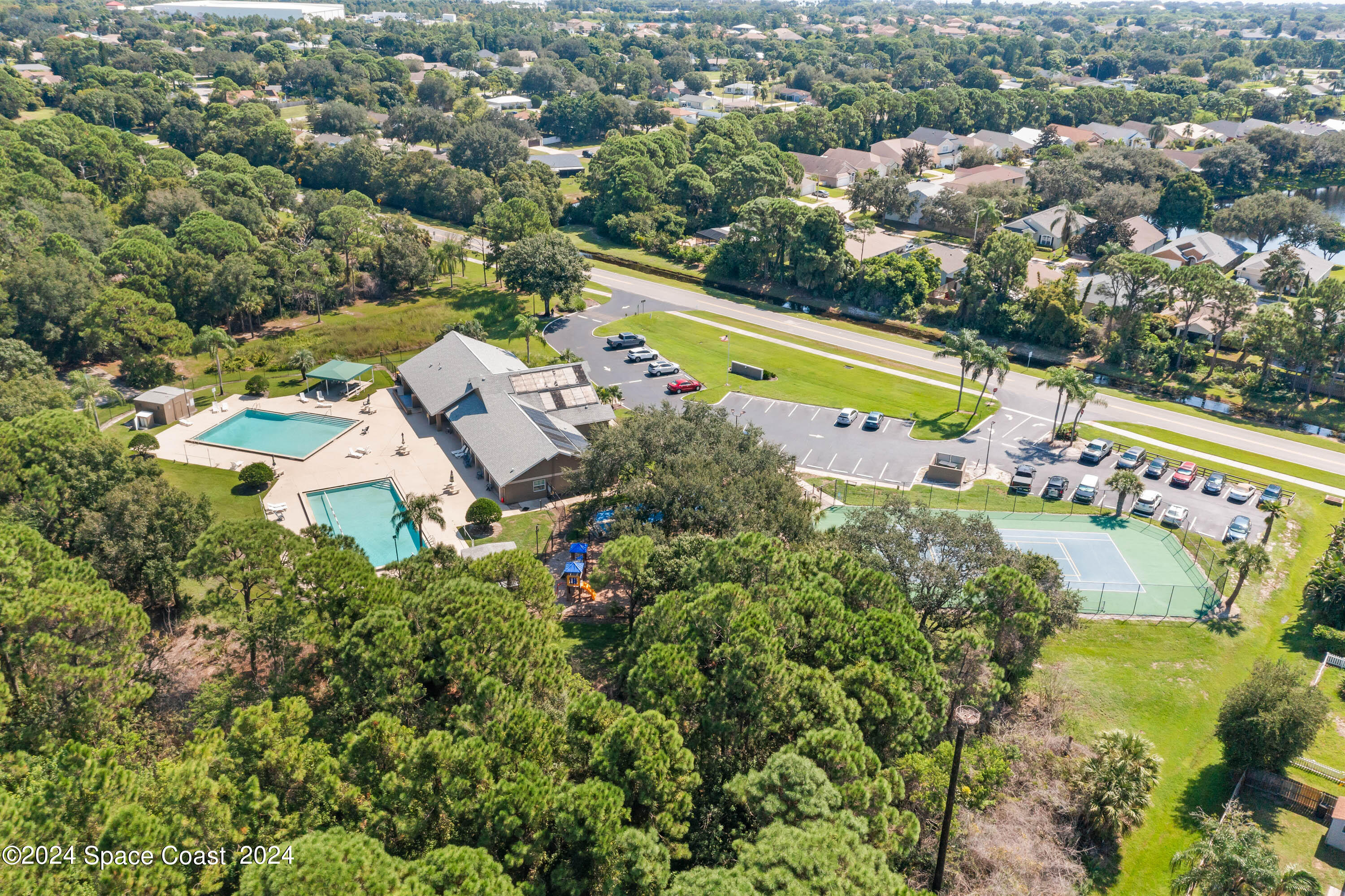 1122 Jan's Place Melbourne, FL 32940 - Photo 41 of 42 an aerial view of house with a swimming pool yard and outdoor seating