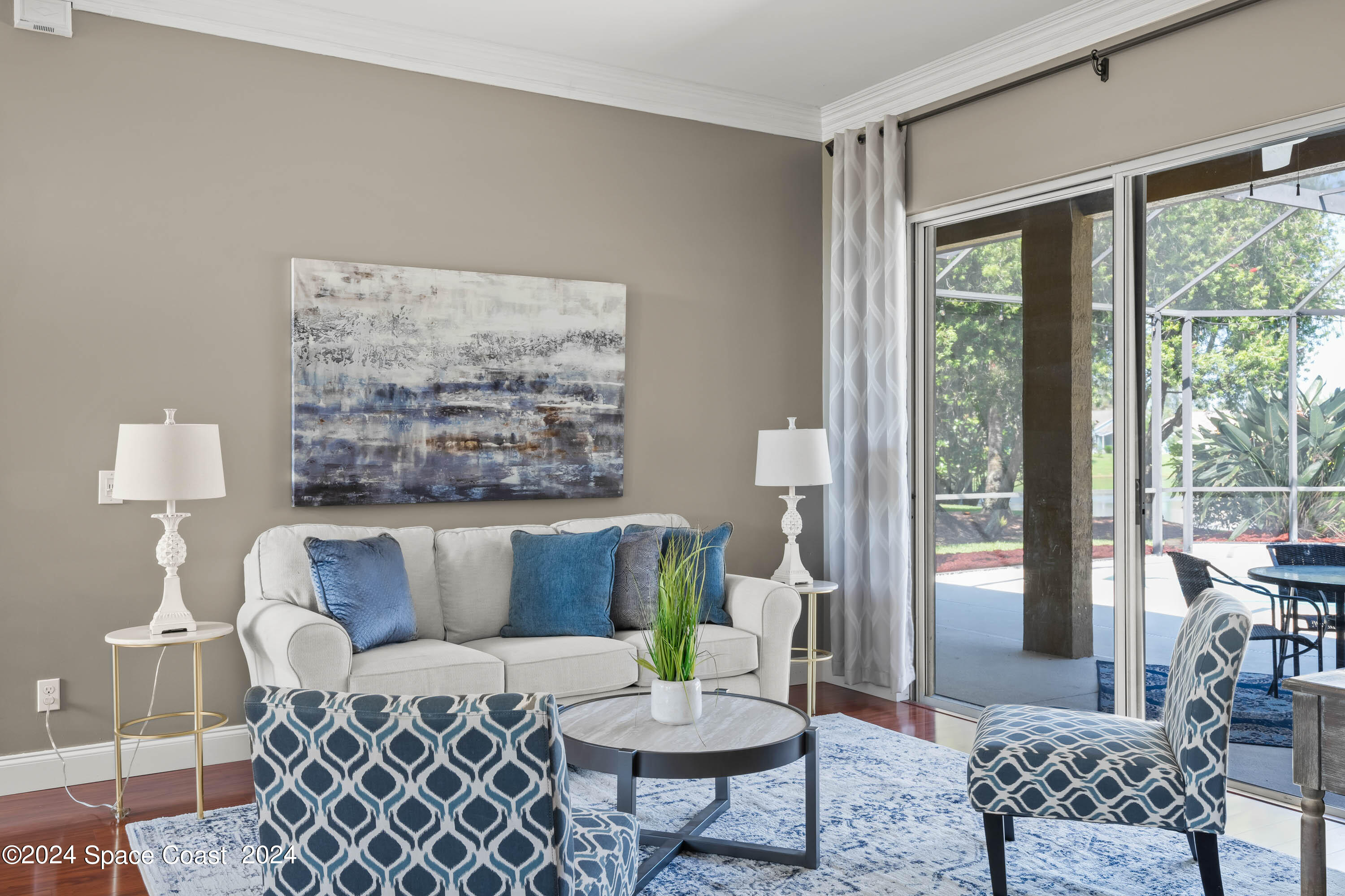 1122 Jan's Place Melbourne, FL 32940 - Photo 5 of 42 a living room with furniture and a large window