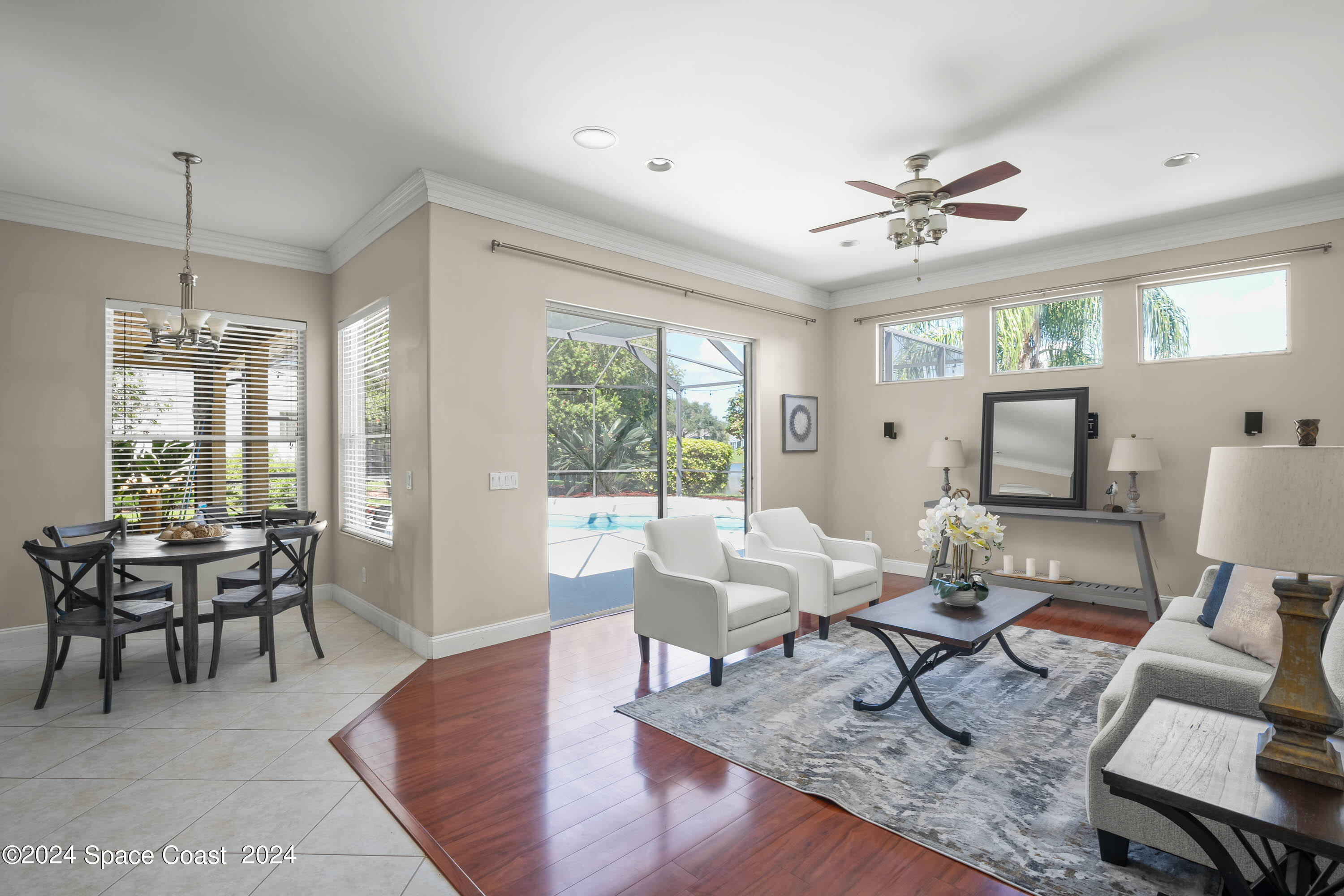 1122 Jan's Place Melbourne, FL 32940 - Photo 10 of 42 a living room with furniture and a large window