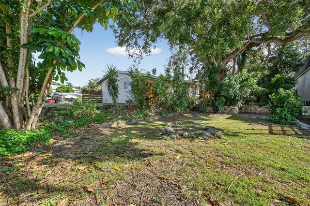 a view of backyard with outdoor space