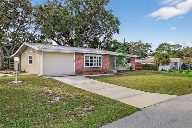 a house view with a garden space