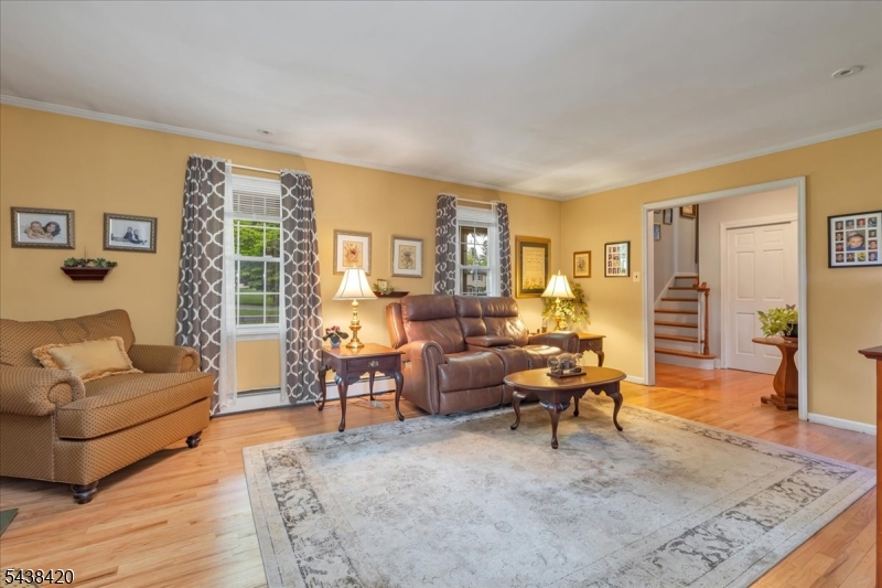 79 Main Street Califon, NJ 07830 - Photo 7 of 50 a living room with furniture and a large window
