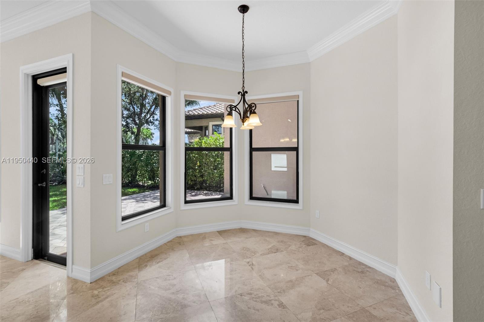 8944 Little Falls Way, Unit 8944 Delray Beach, FL 33446 - Photo 18 of 98 a view of an empty room with a window and fireplace