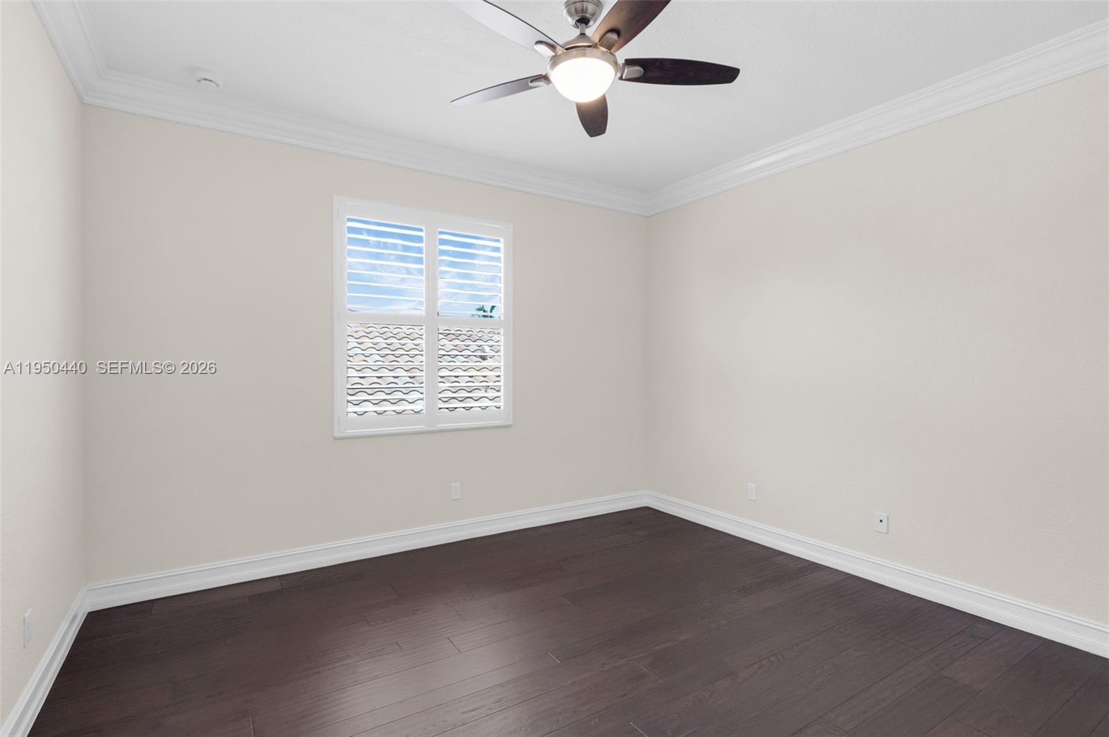8944 Little Falls Way, Unit 8944 Delray Beach, FL 33446 - Photo 34 of 98 an empty room with a window and a fan