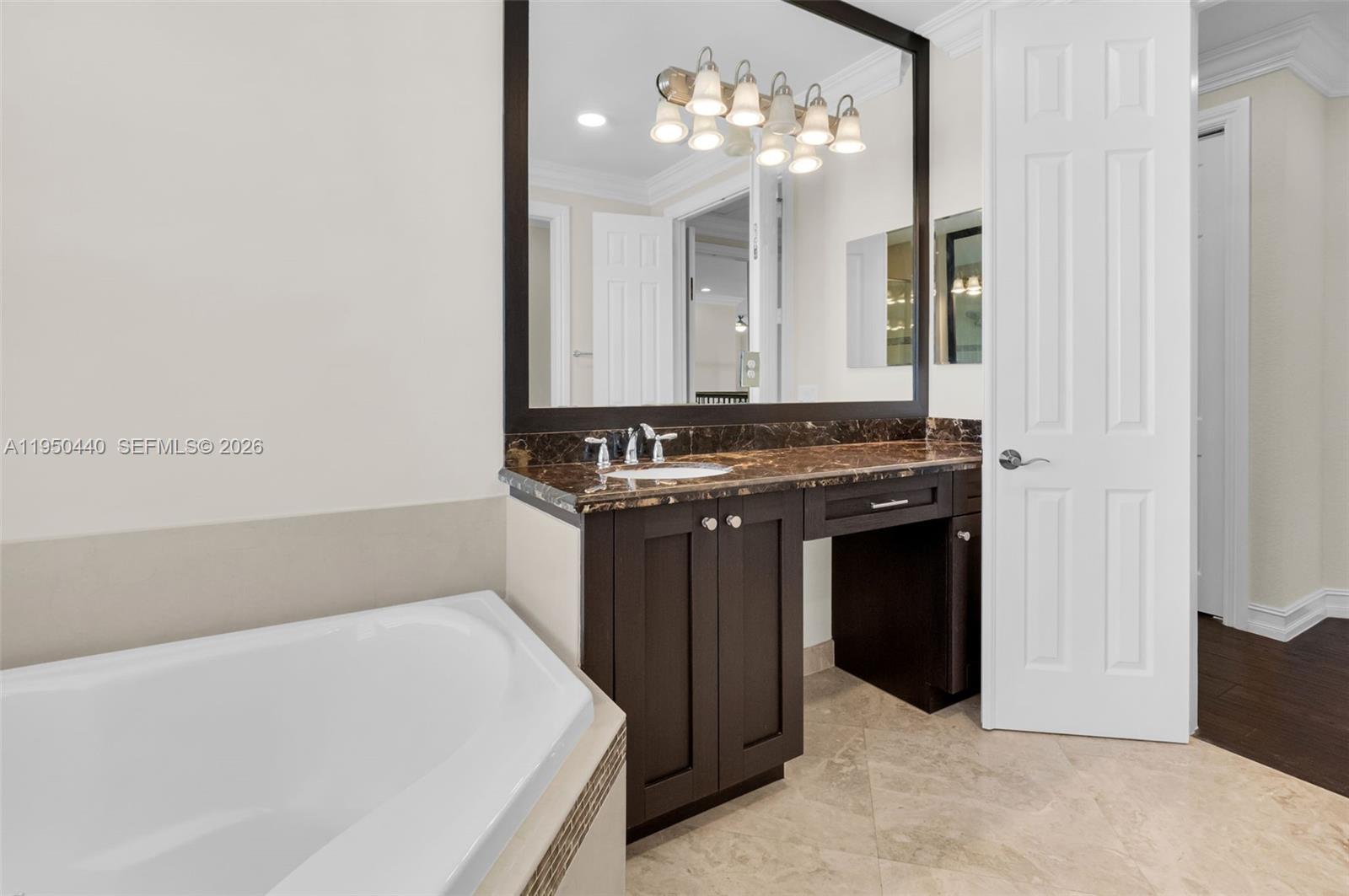 8944 Little Falls Way, Unit 8944 Delray Beach, FL 33446 - Photo 40 of 98 a kitchen with a stove and a refrigerator