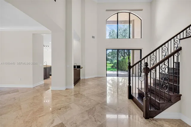 a kitchen with a stove sink and a microwave