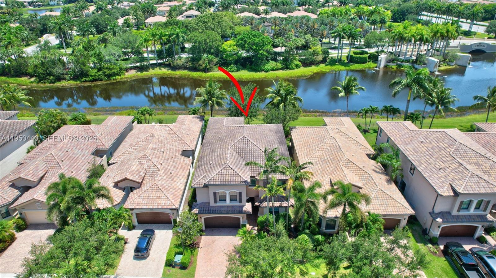 8944 Little Falls Way, Unit 8944 Delray Beach, FL 33446 - Photo 57 of 98 an aerial view of a house with a lake view