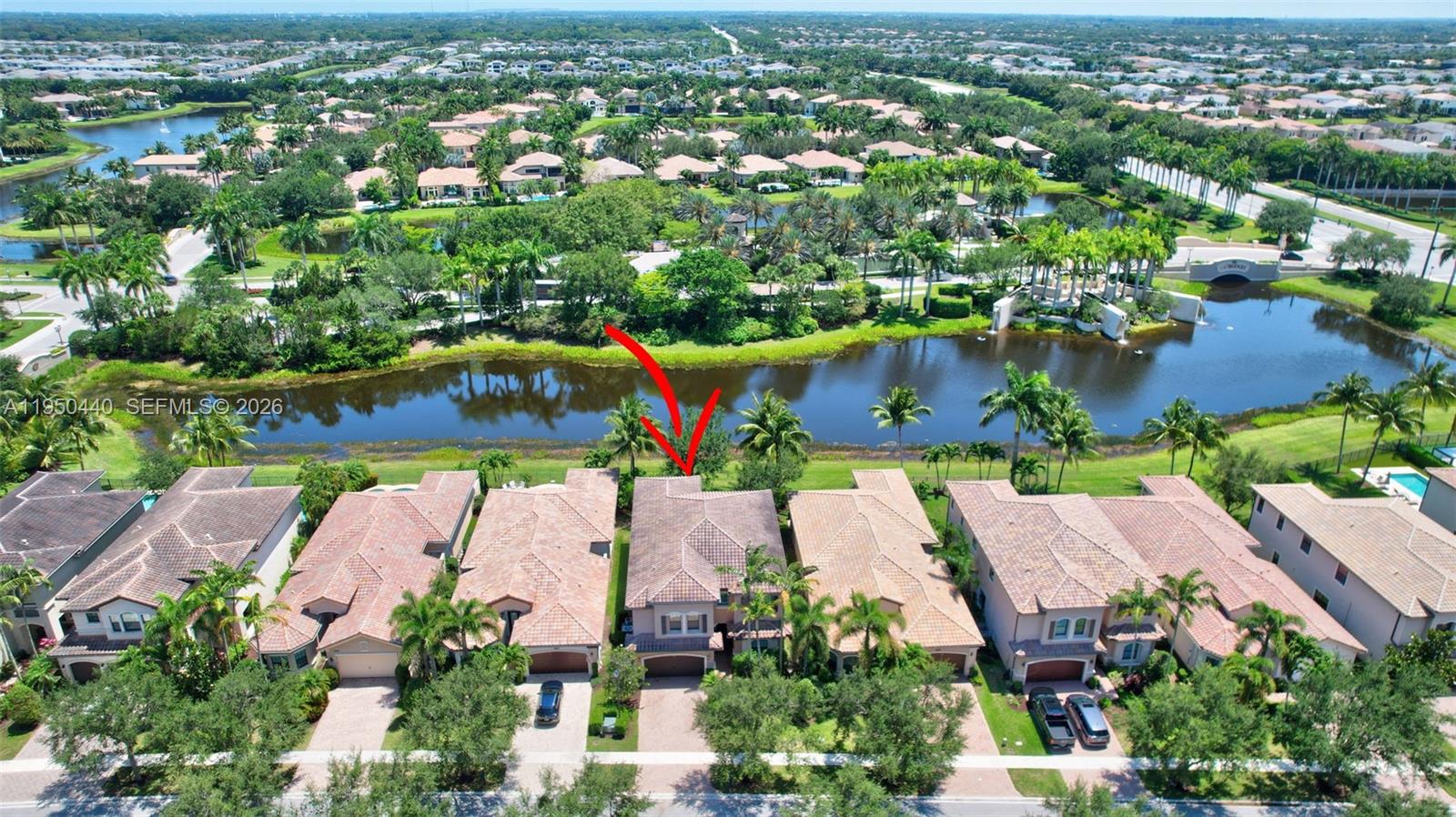 8944 Little Falls Way, Unit 8944 Delray Beach, FL 33446 - Photo 58 of 98 an aerial view of a house with a swimming pool yard and outdoor seating