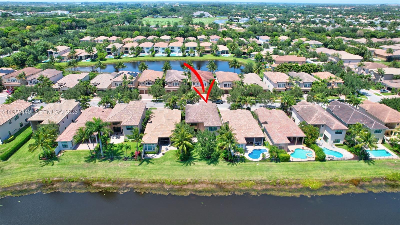 8944 Little Falls Way, Unit 8944 Delray Beach, FL 33446 - Photo 62 of 98 an aerial view of residential houses with outdoor space and street view