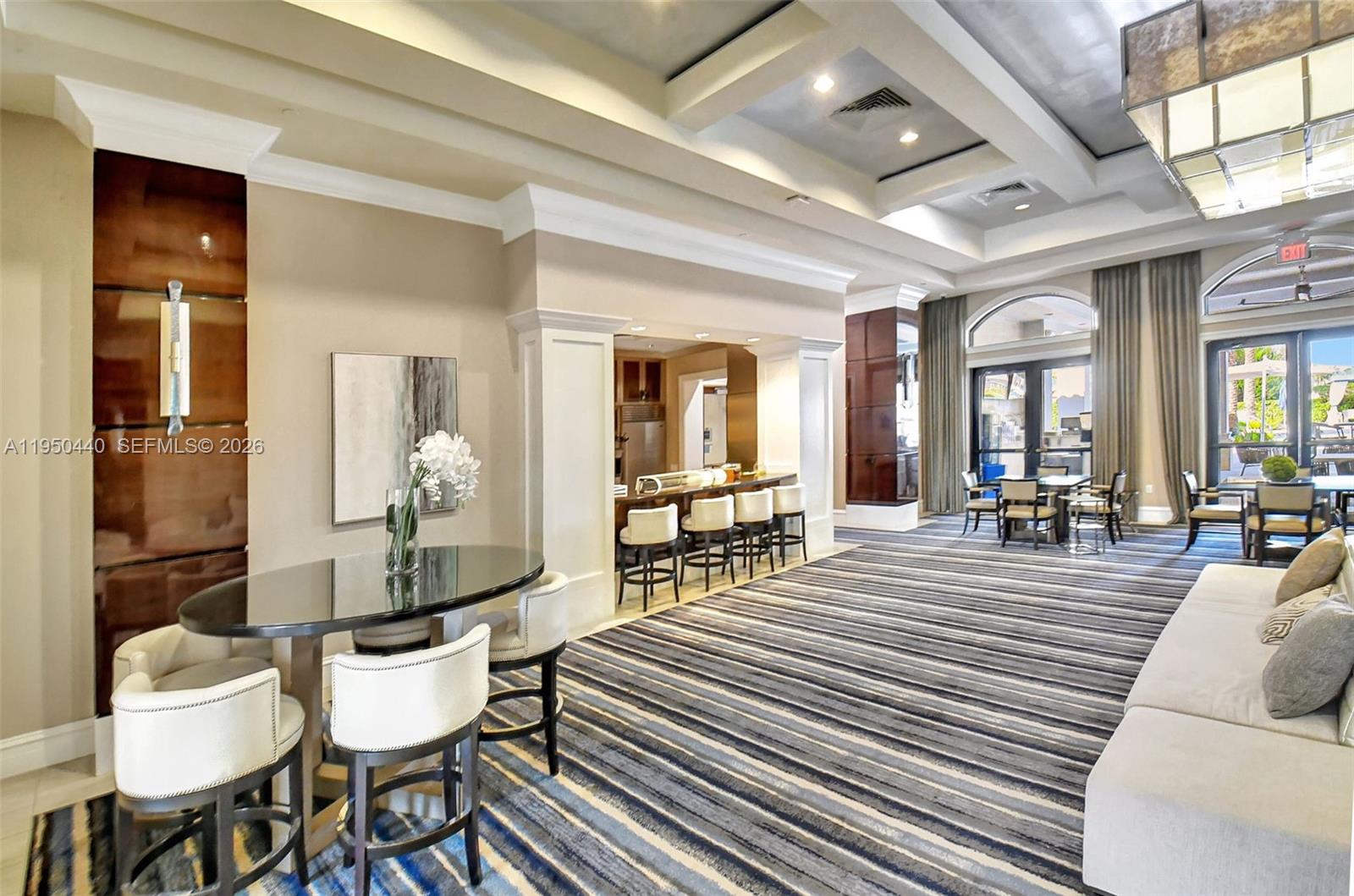 8944 Little Falls Way, Unit 8944 Delray Beach, FL 33446 - Photo 98 of 98 a living room with furniture and a wooden floor