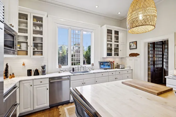 a view of a livingroom with furniture and a dining room