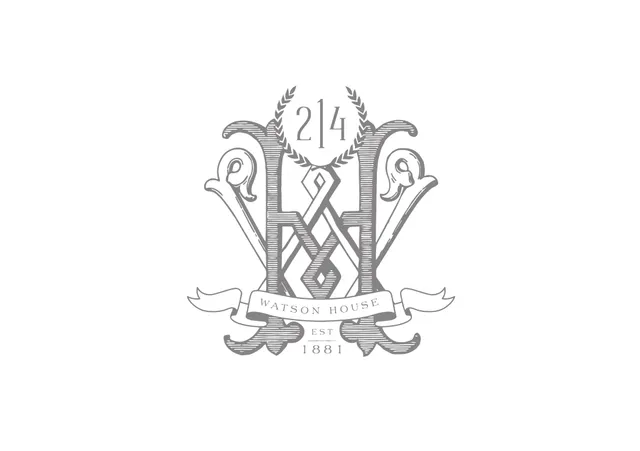 a living room with furniture fireplace and a large window